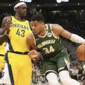 Forward Milwaukee Bucks Giannis Antetokounmpo mencoba melewati forward Indiana Pacers Pascal Siakam pada pertandingan gim ketiga Playoff NBA 2025, 26 April 2025.