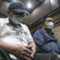 Erintuah dan Mangapul saat mendengarkan pembacaan vonis di Tipikor