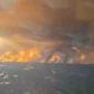 Kebakaran hutan di Kanada memaksa ribuan warga Manitoba dan Saskatchewan mengungsi. Asap menyebar hingga AS, kualitas udara memburuk.